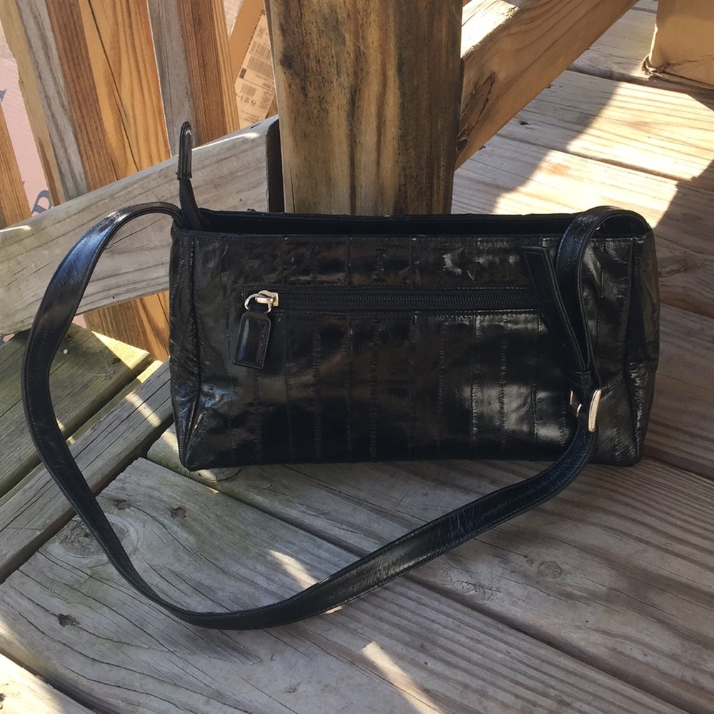 Lee Sands 100% black eel skin purse